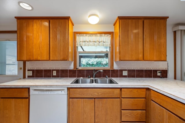 508 W Concord Ave, Grandview, WA 98930 - kitchen with white dishwasher, light countertops, tasteful backsplash, and healthy amount of natural light