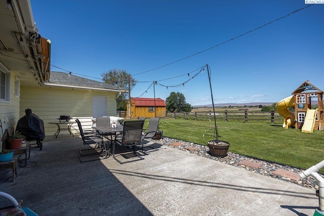 3700 Sheller Rd, Sunnyside, WA 98944 - view of patio / terrace with outdoor dining area, a playground, and a rural view