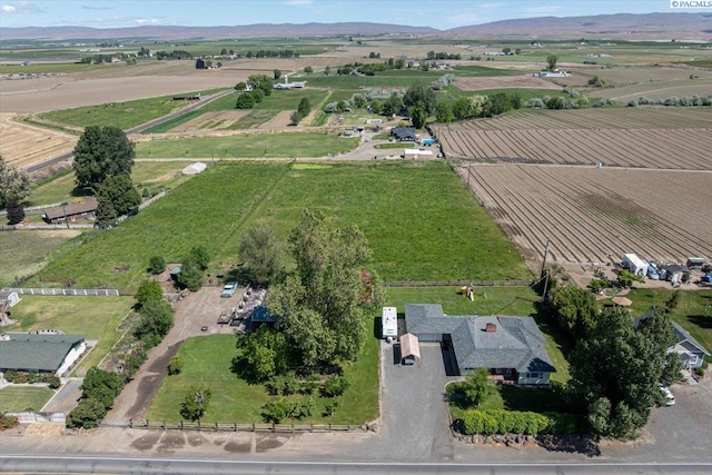 3700 Sheller Rd, Sunnyside, WA 98944 - aerial view of property and surrounding area featuring rural landscape, abundant farmland, and a mountainous background