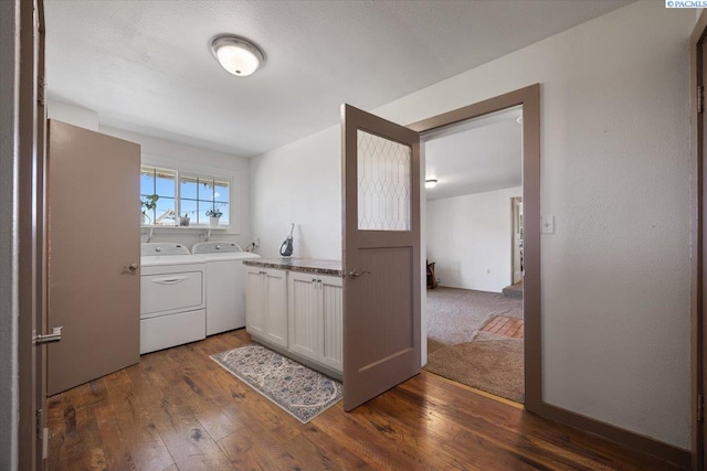 3700 Sheller Rd, Sunnyside, WA 98944 - laundry area with washer and dryer, dark wood finished floors, and cabinet space