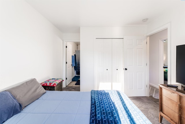 carpeted bedroom featuring a closet