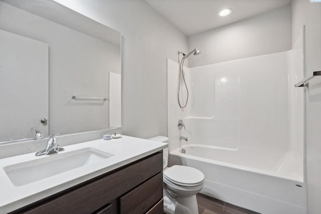 407 Dawson Ln, Pasco, WA 99301 - full bathroom with toilet, wood finished floors, shower / washtub combination, vanity, and recessed lighting