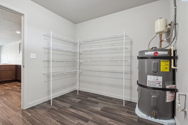 407 Dawson Ln, Pasco, WA 99301 - utility room featuring secured water heater