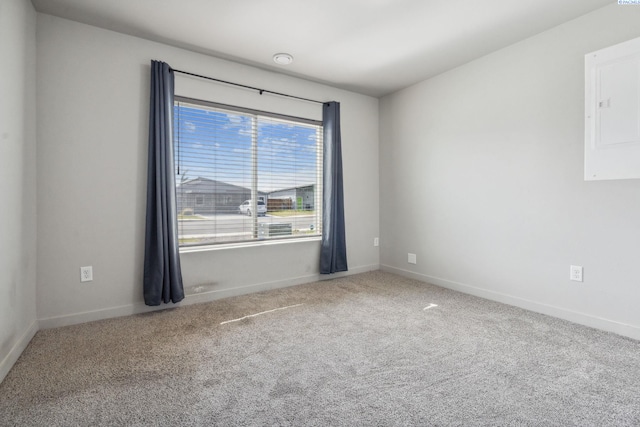 407 Dawson Ln, Pasco, WA 99301 - spare room featuring carpet and baseboards