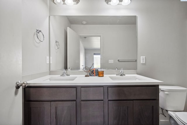 407 Dawson Ln, Pasco, WA 99301 - bathroom featuring toilet and double vanity