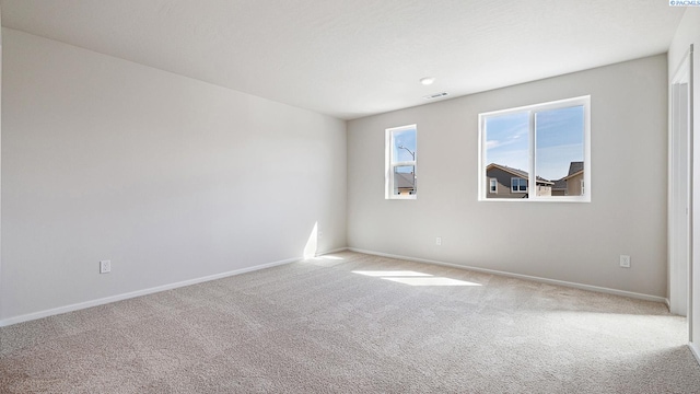 656 S Zeelar St, Kennewick, WA 99336 - spare room featuring carpet floors and baseboards
