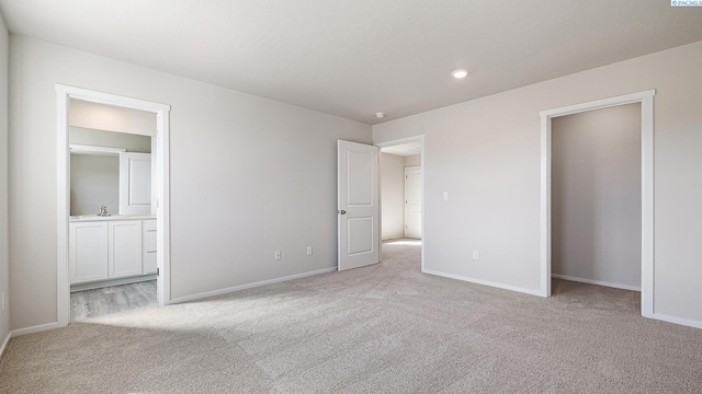 656 S Zeelar St, Kennewick, WA 99336 - unfurnished bedroom with carpet floors, a sink, and baseboards