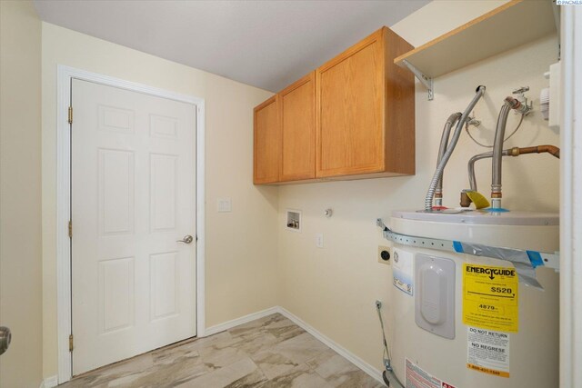 2704 Iris St, West Richland, WA 99353 - laundry room with electric water heater, electric dryer hookup, cabinet space, hookup for a washing machine, and light marble finish floors