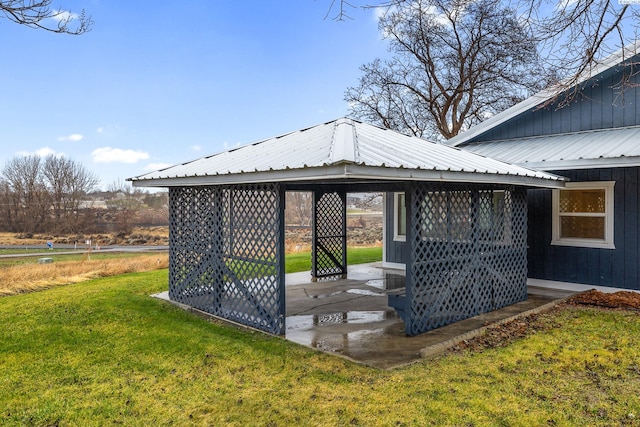 wooden deck featuring a yard