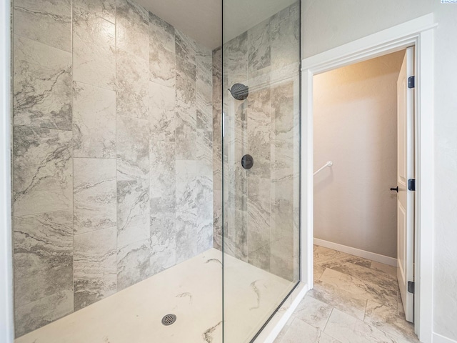 5593 S Lyle Pl, Kennewick, WA 99337 - bathroom featuring a walk in shower and marble look tiles