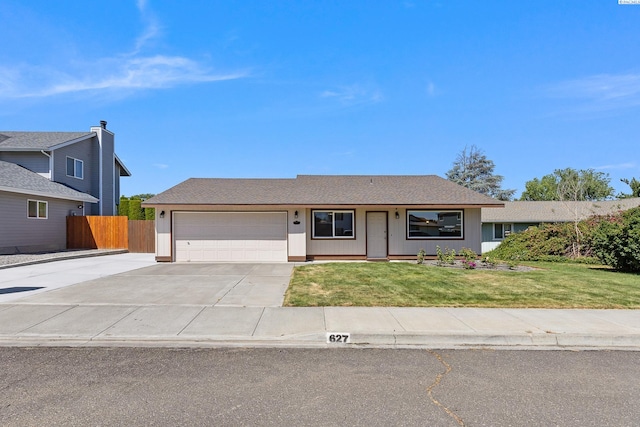 627 N Williams St, Kennewick, WA 99336 - single story home with an attached garage and driveway