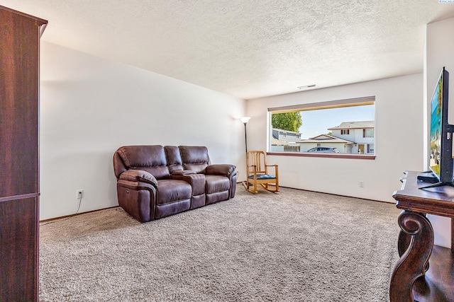 627 N Williams St, Kennewick, WA 99336 - carpeted living area featuring a textured ceiling