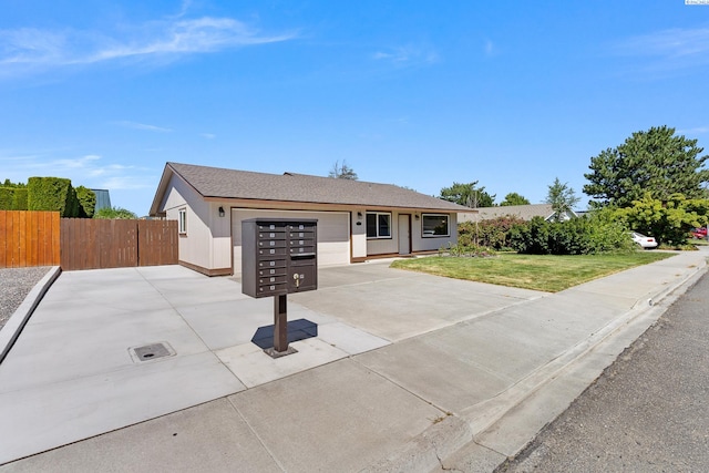 627 N Williams St, Kennewick, WA 99336 - single story home with an attached garage and concrete driveway