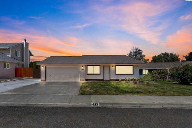 627 N Williams St, Kennewick, WA 99336 - ranch-style house featuring a garage and driveway
