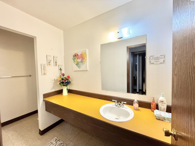 2912 W Hood Ave Unit D104, Kennewick, WA 99336 - bathroom featuring vanity and baseboards
