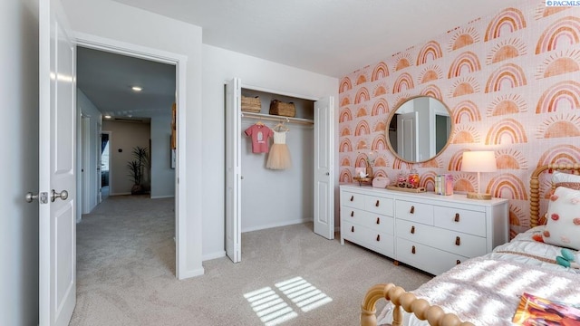 carpeted bedroom featuring a closet