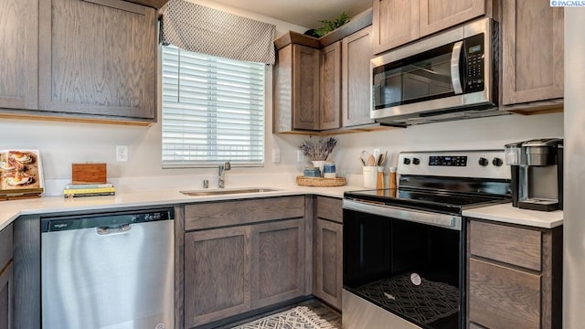 kitchen featuring stainless steel appliances and sink