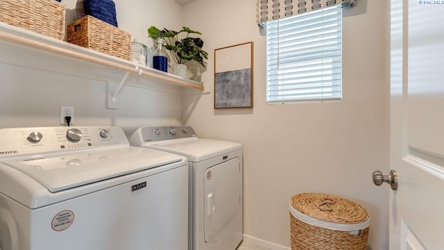 laundry area featuring separate washer and dryer