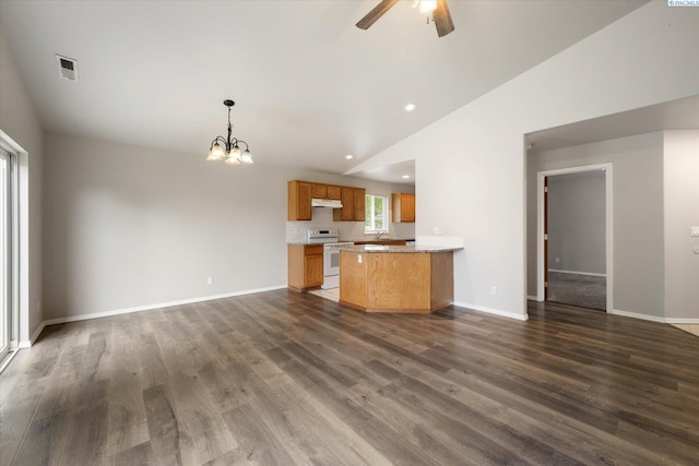 kitchen featuring visible vents, white electric stove, lofted ceiling, and open floor plan