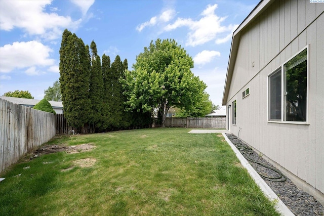 view of yard featuring a fenced backyard