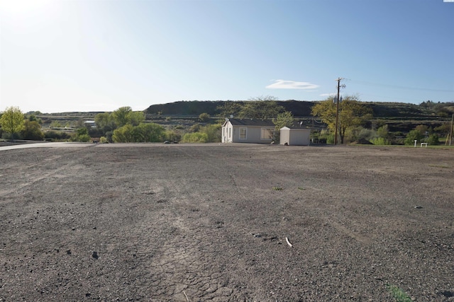 68703 W Island View Pr, Prosser, WA 99350 - view of yard featuring an outdoor structure and a storage unit