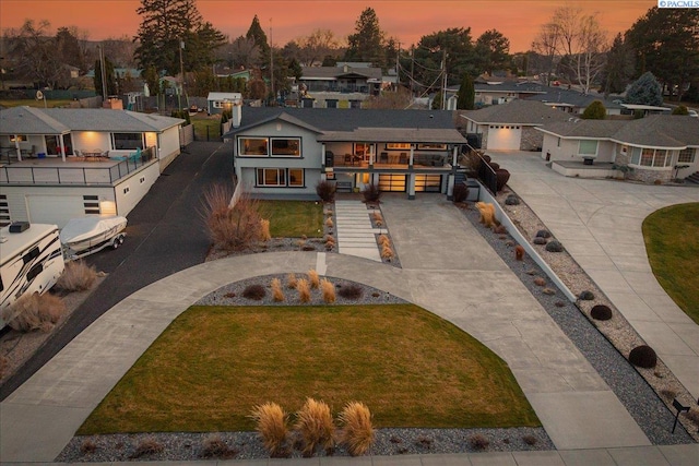 birds eye view of property with a residential view