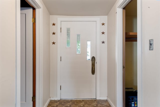 interior space with dark parquet floors