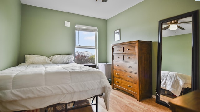 1645 NE Merman Dr Unit B101, Pullman, WA 99163 - bedroom with light wood-style floors and a ceiling fan