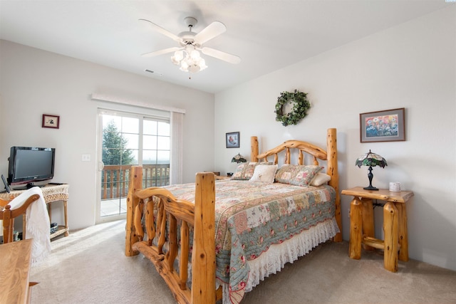 carpeted bedroom with access to outside and ceiling fan