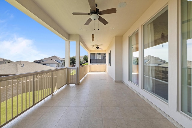 balcony featuring ceiling fan