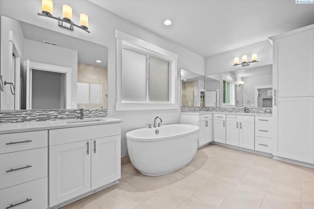 3149 Wild Canyon Way, Richland, WA 99354 - bathroom with a shower stall, two vanities, and a soaking tub