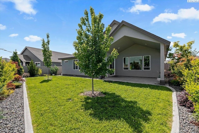 3149 Wild Canyon Way, Richland, WA 99354 - back of house featuring stucco siding and a patio area