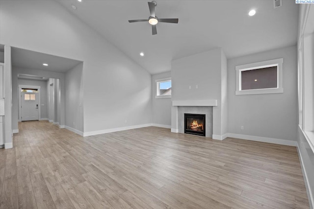 3149 Wild Canyon Way, Richland, WA 99354 - unfurnished living room with a glass covered fireplace, a ceiling fan, light wood-style flooring, baseboards, and recessed lighting