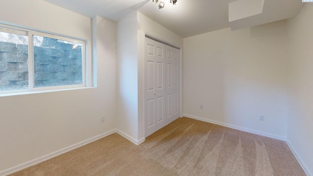1220 SW Wadleigh Dr, Pullman, WA 99163 - unfurnished bedroom featuring light colored carpet, a closet, and baseboards