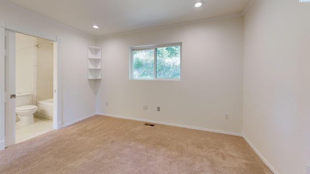 1220 SW Wadleigh Dr, Pullman, WA 99163 - unfurnished bedroom featuring crown molding, light carpet, recessed lighting, baseboards, and ensuite bathroom