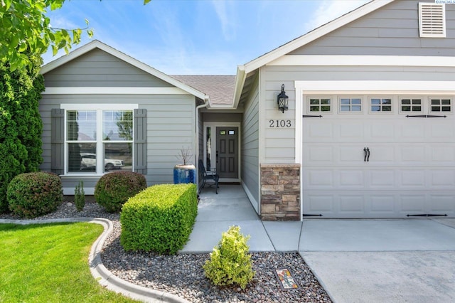 property entrance featuring a garage