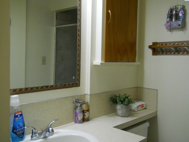 619 Grandview Ave, Sunnyside, WA 98944 - bathroom featuring vanity and a stall shower