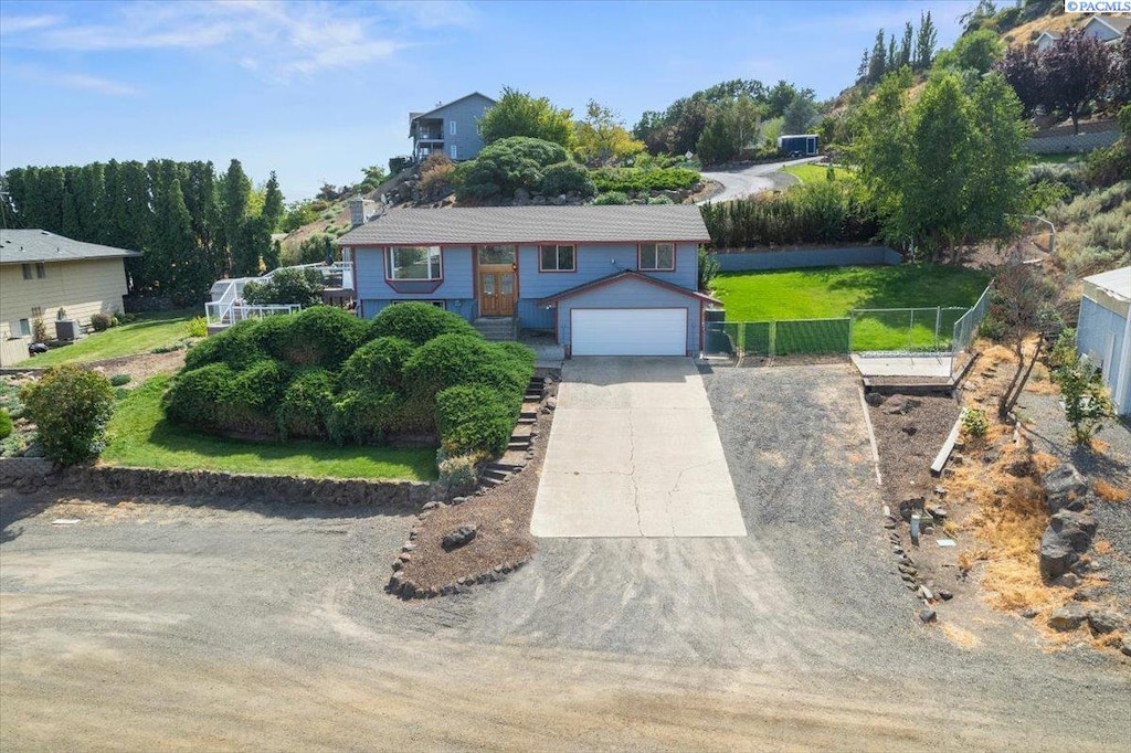 single story home with a garage