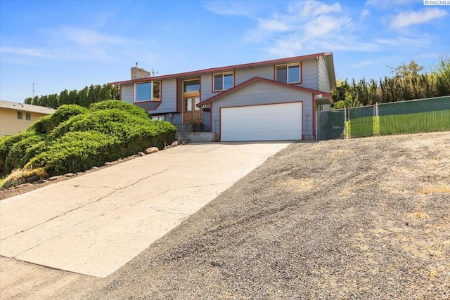 view of front of property featuring a garage