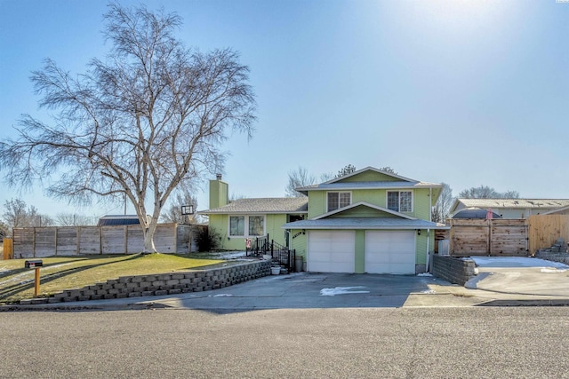 view of front of property featuring a garage