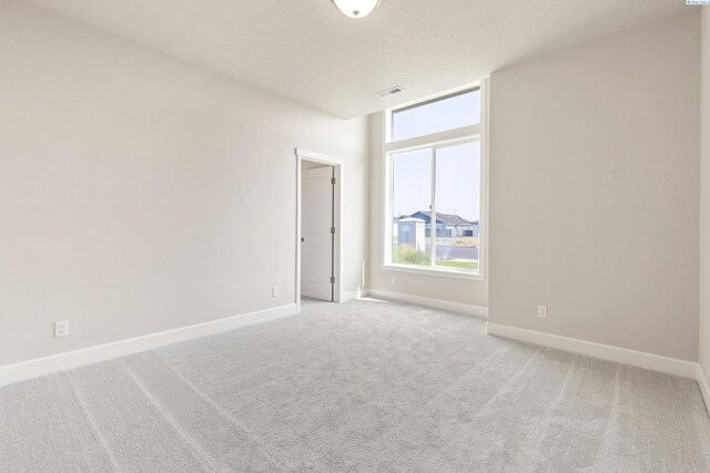 8801 Dusty Maiden Dr, Pasco, WA 99301 - unfurnished room with carpet floors and baseboards