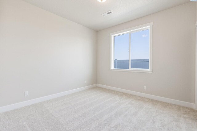 8801 Dusty Maiden Dr, Pasco, WA 99301 - empty room featuring light carpet and baseboards