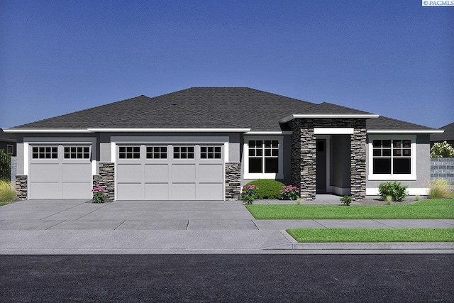 prairie-style home featuring a garage