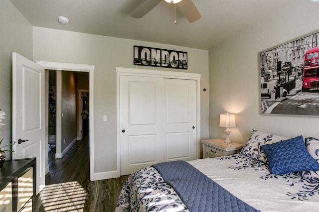 bedroom with a closet, ceiling fan, baseboards, and wood finished floors