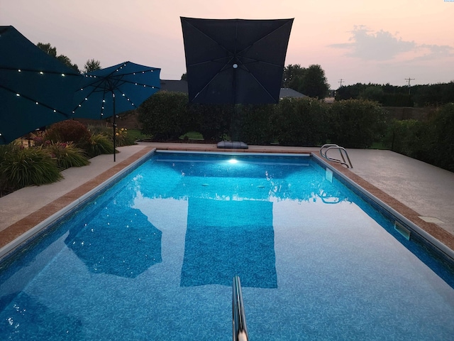 pool featuring a patio area