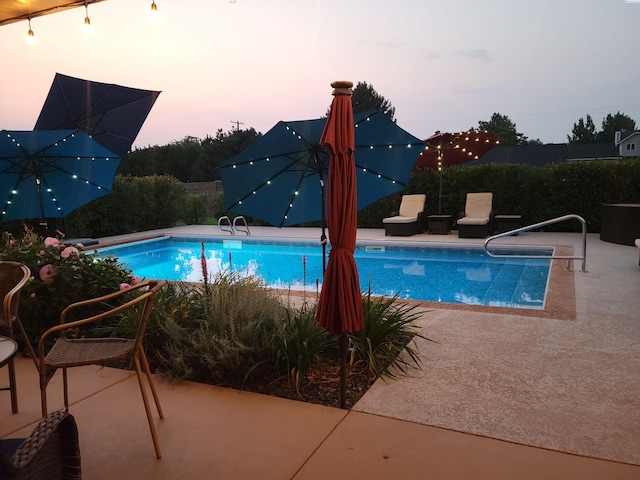 pool featuring a patio area