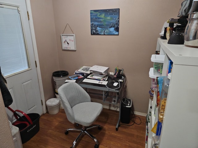 office area featuring dark wood-style floors and baseboards