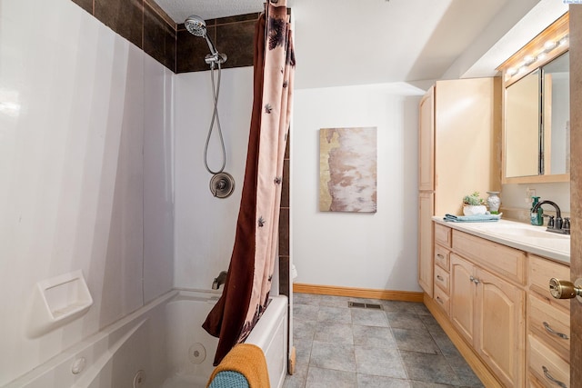 108 W 45th Ave, Kennewick, WA 99337 - full bathroom with shower / bath combo with shower curtain, vanity, baseboards, and visible vents