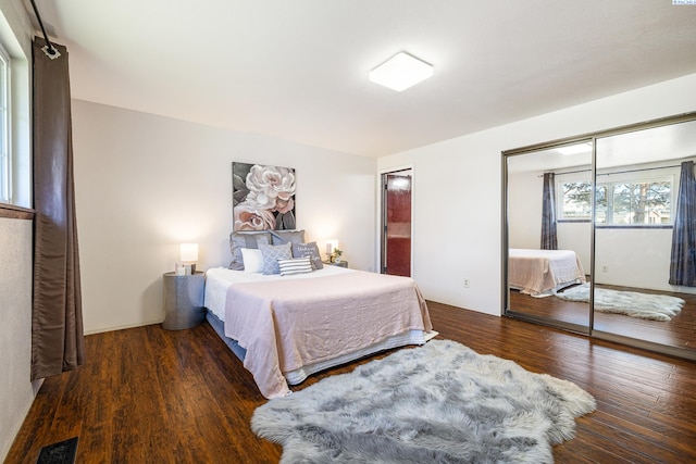 108 W 45th Ave, Kennewick, WA 99337 - bedroom with wood finished floors, a closet, and visible vents