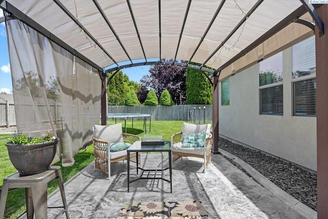 406 W 49th Ave, Kennewick, WA 99337 - view of patio / terrace with a trampoline and an outdoor hangout area